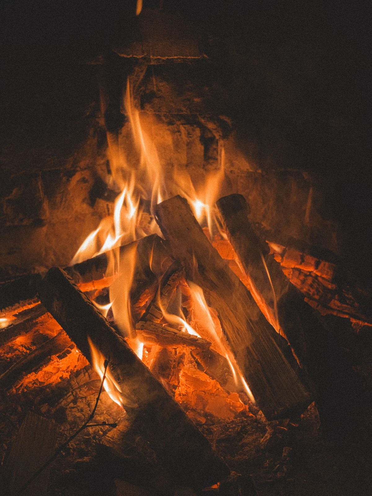 Close view of burning wood inside a firebox